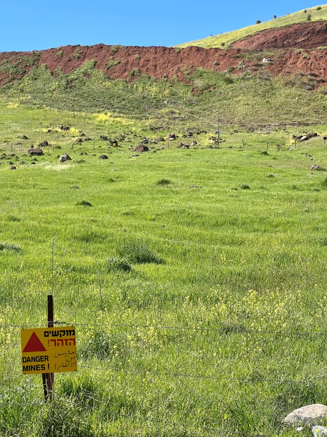 Signs on our route cautioned about remaining land mines.